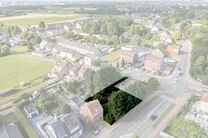 Beautiful wide plot of 5 ares 51 centiares intended for the construction of a multi-family building, comprising a maximum of two floors below the eaves, with a pitched roof.