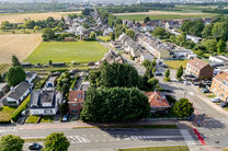 Beautiful wide plot of 5 ares 51 centiares intended for the construction of a multi-family building, comprising a maximum of two floors below the eaves, with a pitched roof.