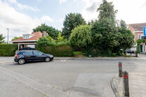 Beautiful wide plot of 5 ares 51 centiares intended for the construction of a multi-family building, comprising a maximum of two floors below the eaves, with a pitched roof.