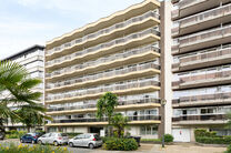 This spacious 2-bedroom apartment, featuring 2 terraces, a private garage box, and a parking space, is located on the third floor of a well-maintained residential building.

LAYOUT:
The entrance hall leads to a bright living room with a dining area and a 